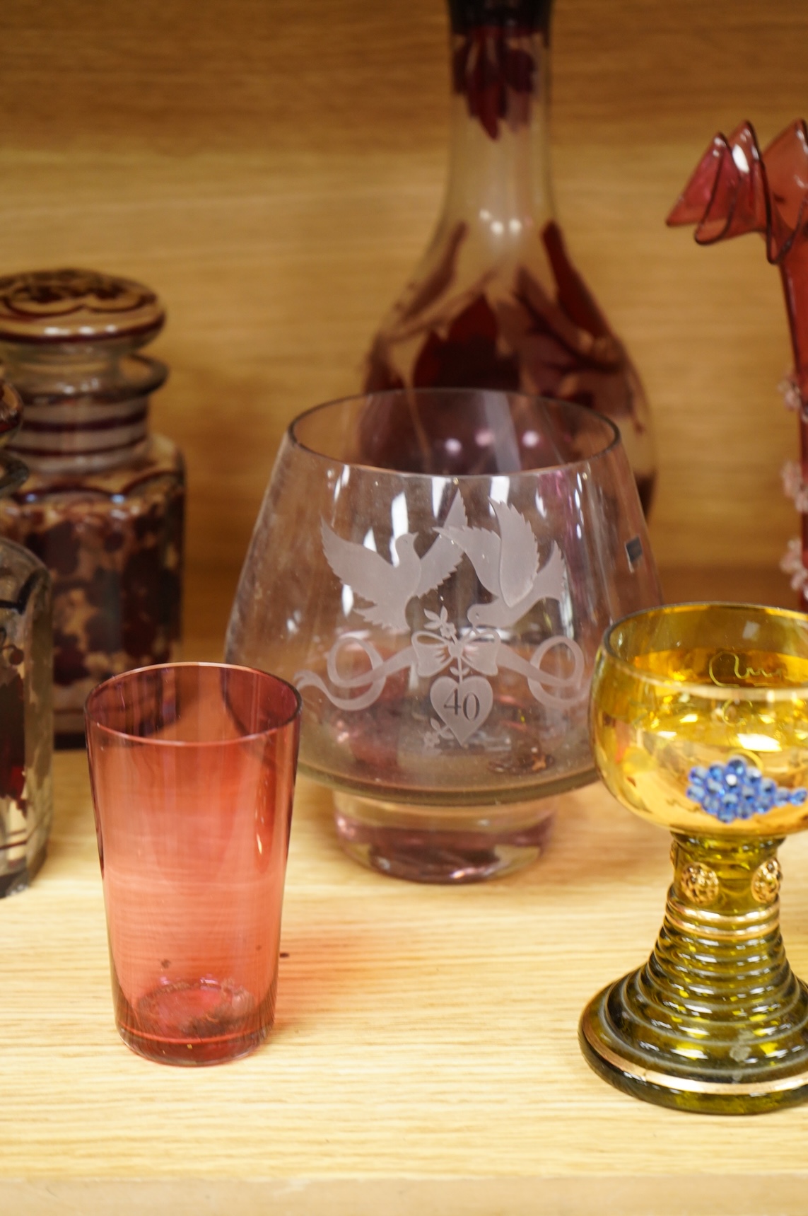 A collection of 19th century and later glassware to include three goblets, a pair of vases with trailed decoration and a Caithness glass vase, largest 28cm high